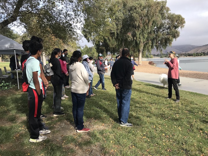 Photo of Lisa speaking to the Earth Day event attendees